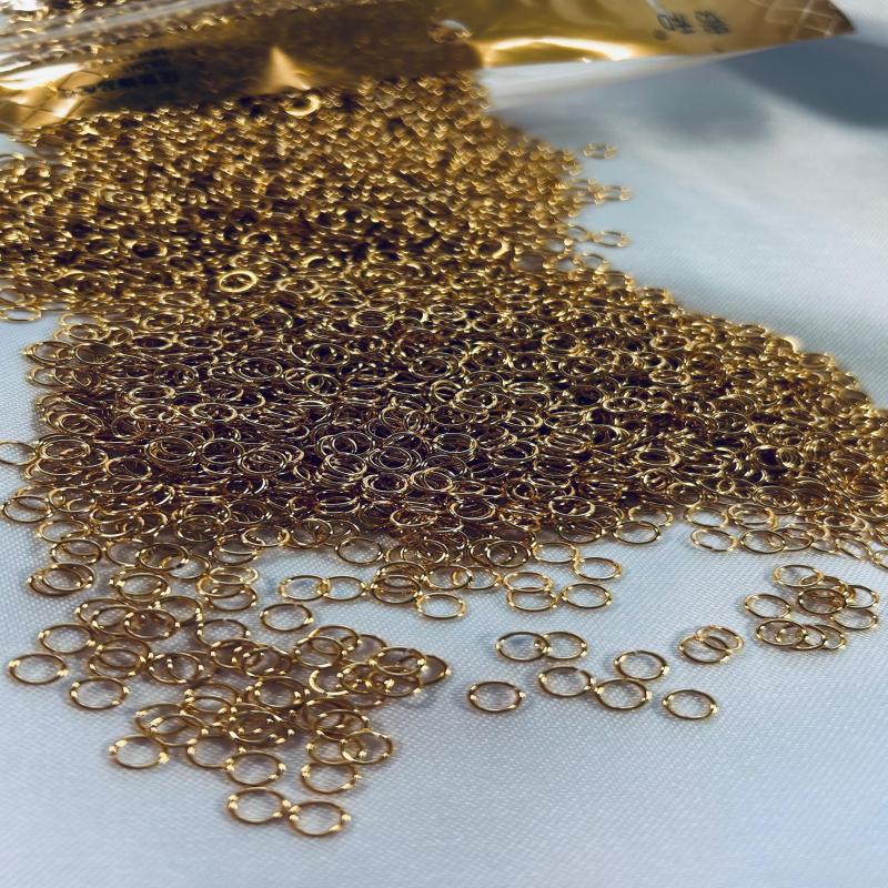 ARGOLLA DE ACERO DORADO